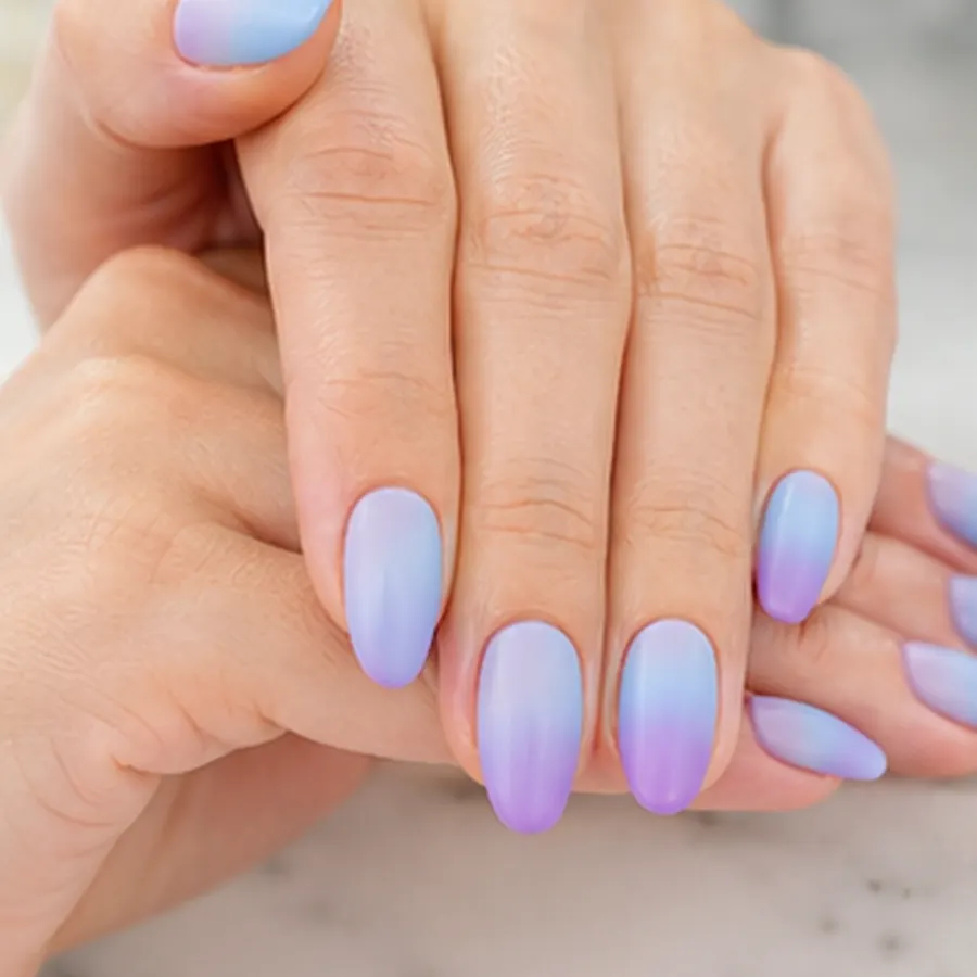 Pastel blue and purple ombre nails by Lumi Nails & Beauty